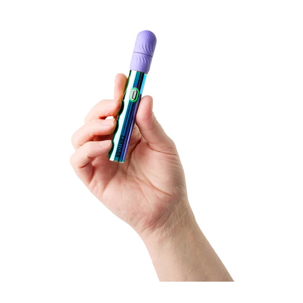 Cartisan Flex vaporizer in Rainbow held in hand